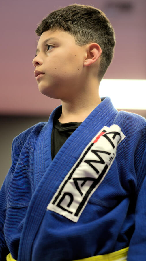 Portrait of Jiu Jitsu student wearing his Gi.